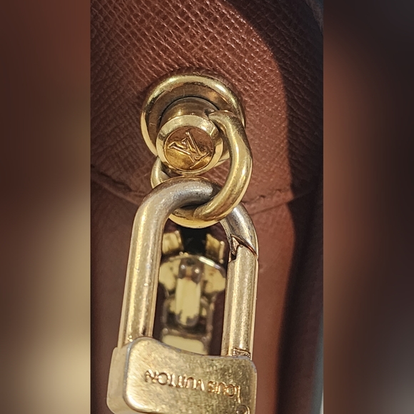 Louis Vuitton Orsay clutch/wristlet. Int & ext pockets have been cleaned out. - Picture 8 of 16